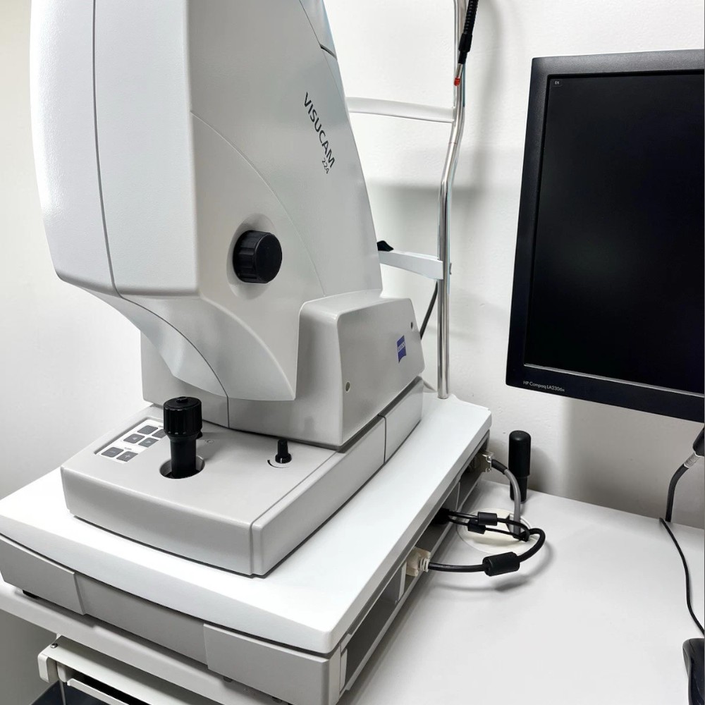 Zeiss Visucam 224 Non-Mydriatic Fundus Camera w/ Electric Table - Used 8 Zeiss Visucam 224 used — left three-quarter view beside external monitor