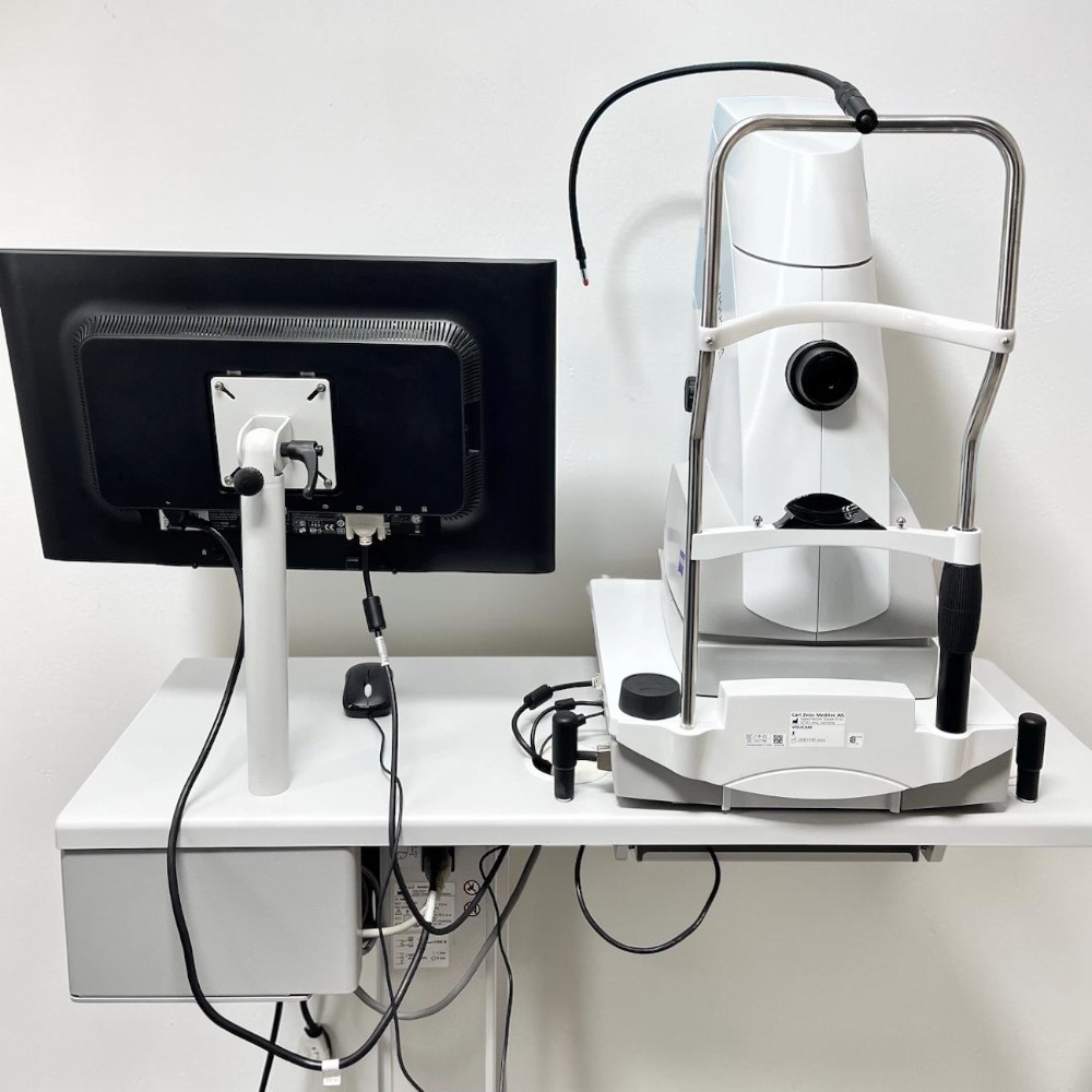 Zeiss Visucam 224 Non-Mydriatic Fundus Camera w/ Electric Table - Used 9 Zeiss Visucam 224 used — rear three-quarter view with monitor and cabling on the table